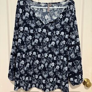 Floral boho style lightweight top by Brina & Em with 3/4 sleeves